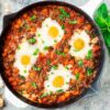 Eggs baked with chicken and tomatoes